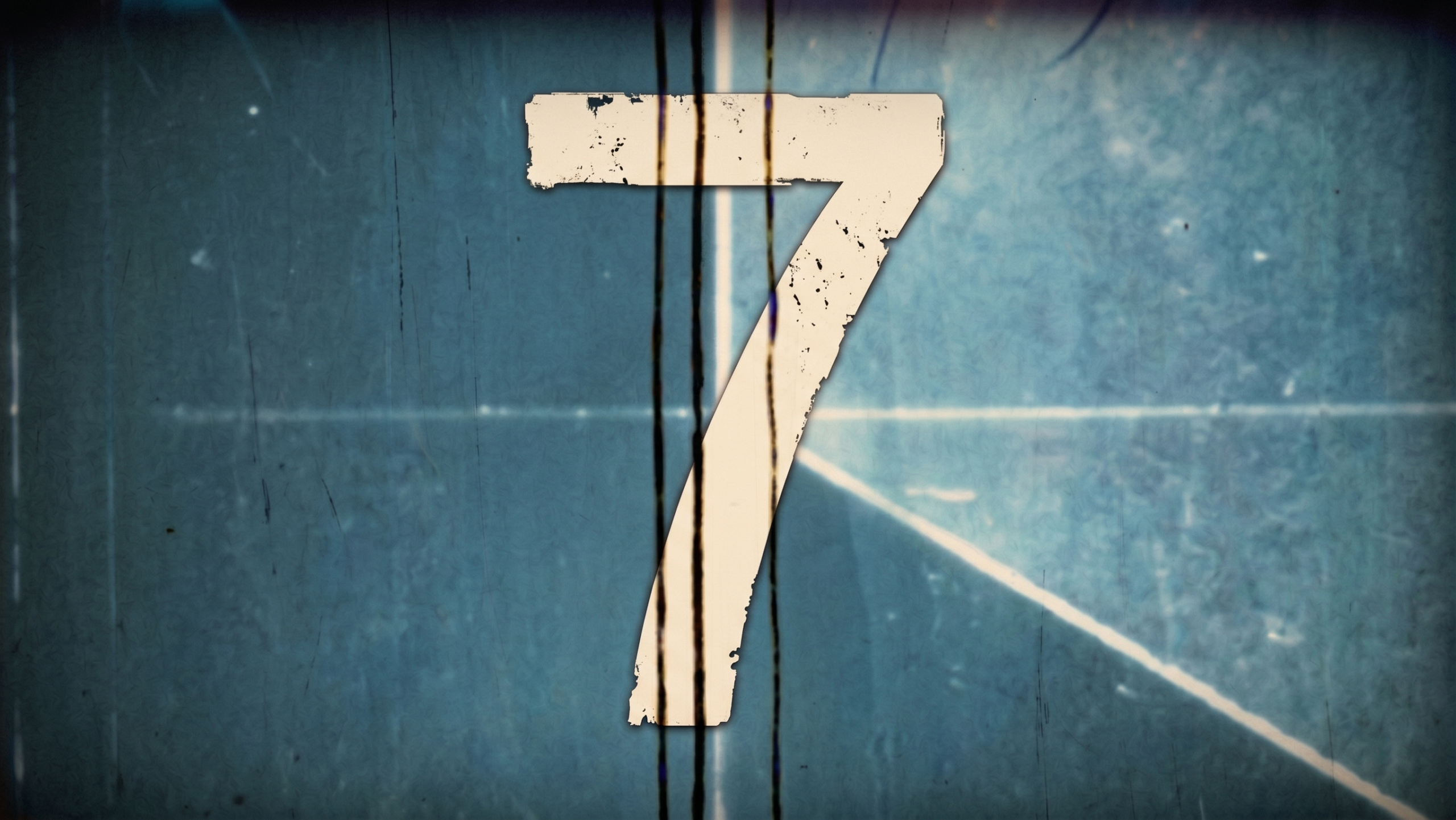 Countdown seven — Lake Placid Film Festival 2026 A weathered number seven on a wall — the countdown to the 2026 Lake Placid Film Festival at the Palace Theatre on Main Street